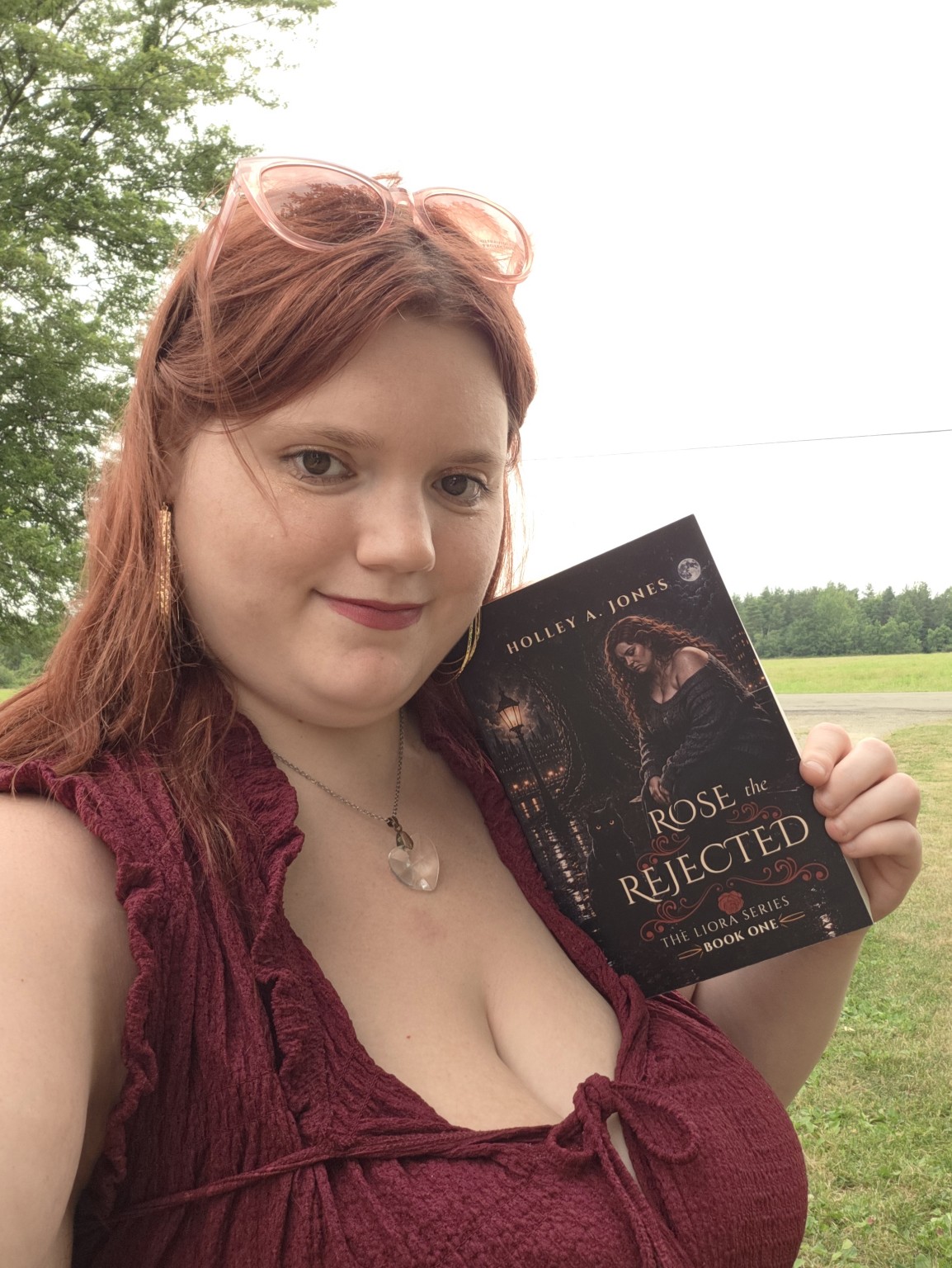 Author Holley A. Jones holding ROSE the REJECTED